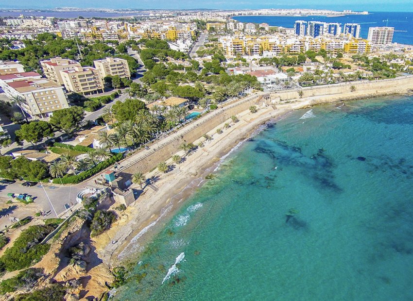 Obra nueva - Casa adosada -
Orihuela Costa