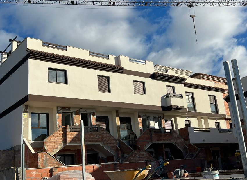 Obra nueva - Casa adosada -
Portmán