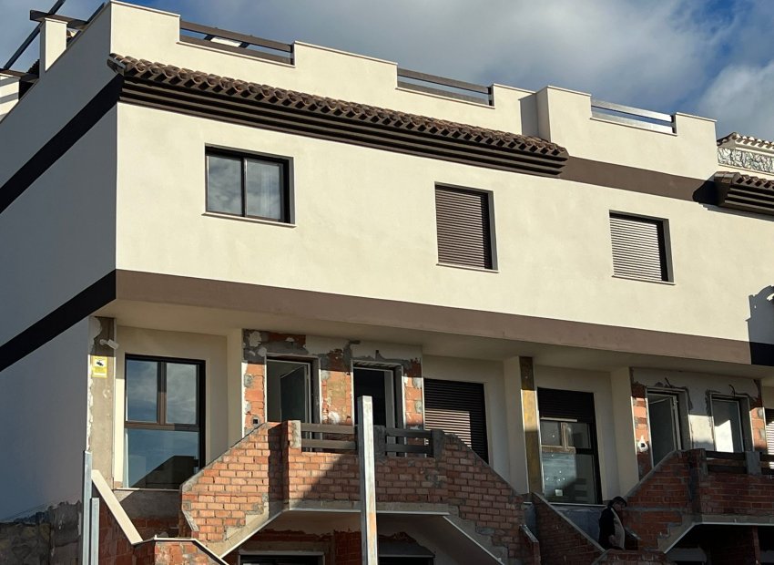 Obra nueva - Casa adosada -
Portmán