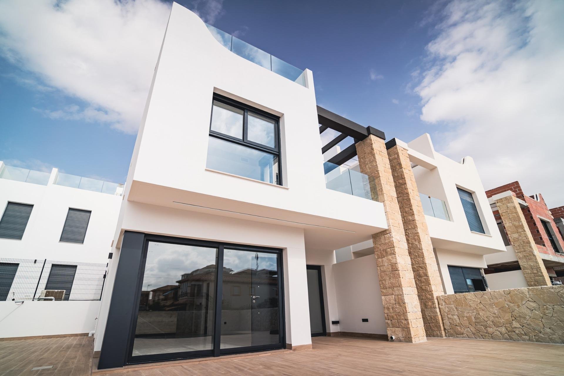 Obra nueva - Villa -
Orihuela Costa - Punta Prima
