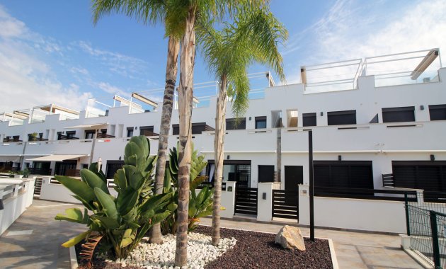 Obra nueva - Casa adosada -
Pilar de la Horadada