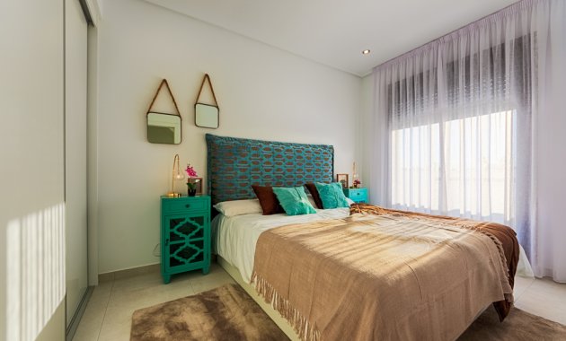 Obra nueva - Casa adosada -
Pilar de la Horadada