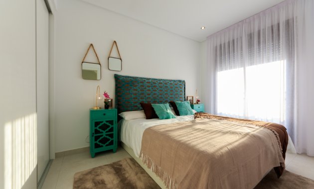 Obra nueva - Casa adosada -
Pilar de la Horadada