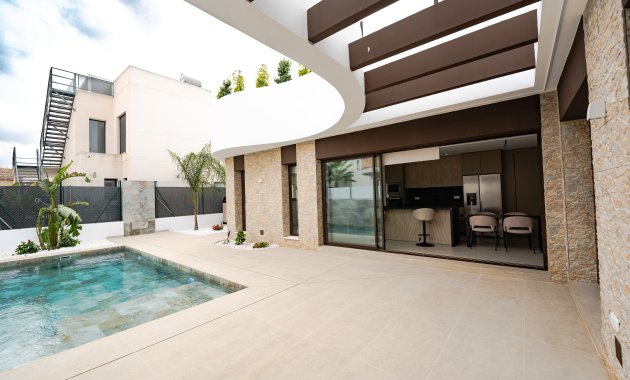 Obra nueva - Casa adosada -
Almoradí - Las Heredades