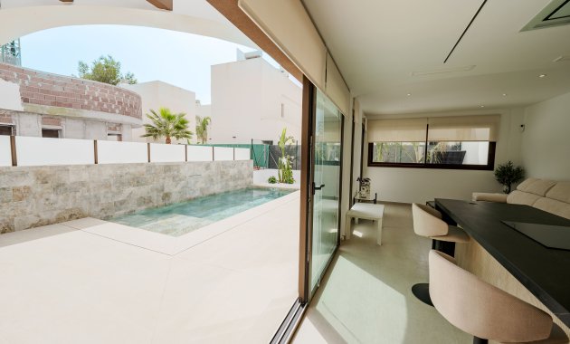 Obra nueva - Casa adosada -
Almoradí - Las Heredades