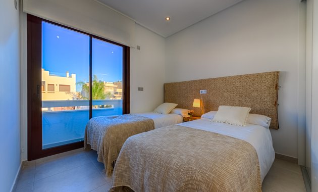 Obra nueva - Casa adosada -
Pilar de la Horadada